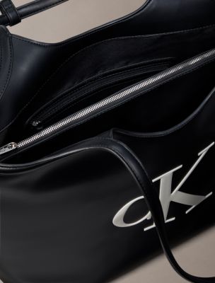 Женская сумка Calvin Klein Embossed Monogram, цвет: Чёрный / Белый — фото 2