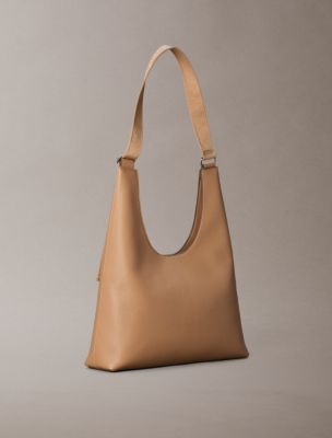 Женские сумки Calvin Klein Logo Strap Shoulder — фото 2