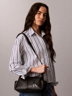 Женские сумки Calvin Klein Embossed Monologo Crossbody — фото 4