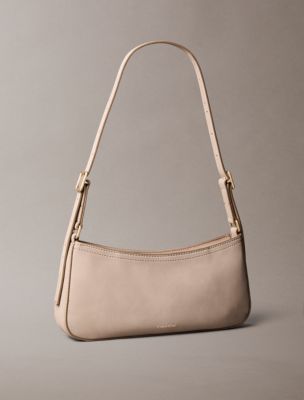 Женская сумка Calvin Klein Sueded Minimal Monogram Small Shoulder, цвет: Пустынный серо-коричневый — фото 2
