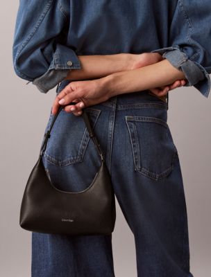 Женские сумки Calvin Klein Embossed Logo Convertible Mini Shoulder — фото 4