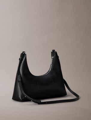 Женские сумки Calvin Klein Embossed Logo Convertible Shoulder — фото 2