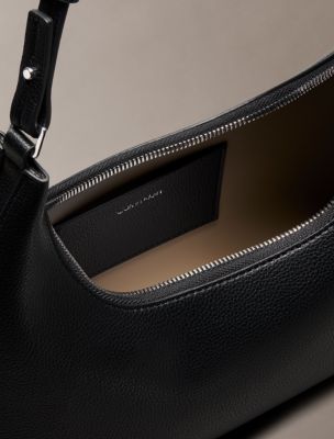 Женские сумки Calvin Klein Embossed Logo Convertible Shoulder — фото 3