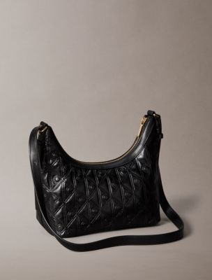 Женская сумка Calvin Klein Debossed Allover Emblem Logo Small Shoulder, цвет: Чёрный — фото 2