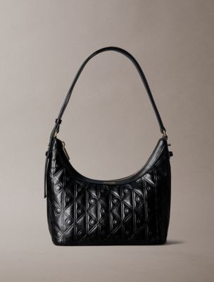 Женская сумка Calvin Klein Debossed Allover Emblem Logo Small Shoulder, цвет: Чёрный — фото 1