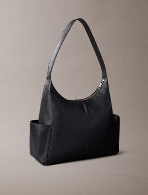 Женские сумки Calvin Klein Embossed Monologo Pocket Shoulder — фото 2