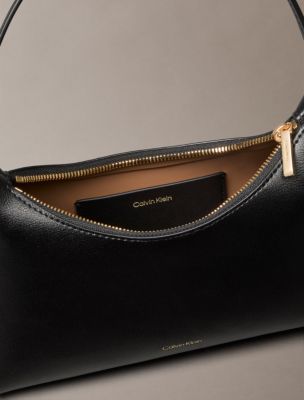 Женская сумка Calvin Klein Foil Logo Small Shoulder, цвет: Чёрный / Кокосовый — фото 3