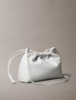 ハンドバッグ   Women's CKJ Drawstring Crossbody Ivory 4K3060GP 4K3060G_VFS_main