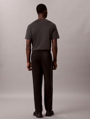 Мужские брюки Calvin Klein Logo Tape Fleece Sweatpants — фото 4