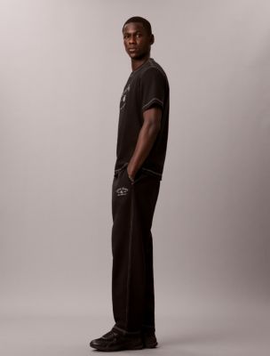 Мужские брюки Calvin Klein Stitch Arch Logo Graphic Sweatpants — фото 5