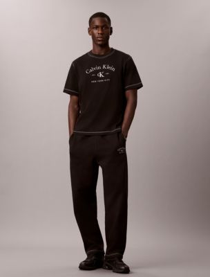Stitch Arch Logo Graphic Sweatpants, Black