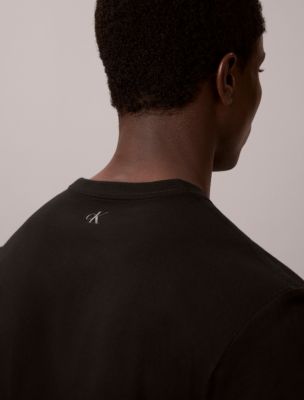 Мужская футболка Calvin Klein Slanted Calvin Logo Graphic, цвет: Чёрный — фото 4