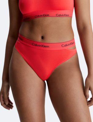 Elastic female boxer's ass in red thongs, close-up, Stock Photo