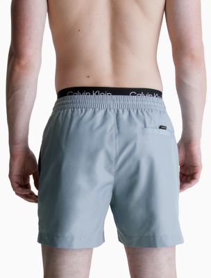 Blue calvin klein swim shorts best sale