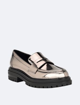 Calvin klein 2025 flat shoes sale