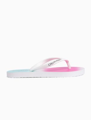 white calvin klein flip flops