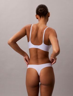 Трусы-стринги Invisibles — Calvin Klein, цвет: Кремовый — фото 4